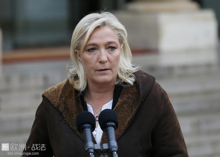 706449-la-presidente-du-front-national-marine-le-pen-s-exprime-devant-la-presse-.jpg