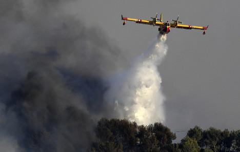 1470895463_fires.in.pics.wildfires.afp.jpg